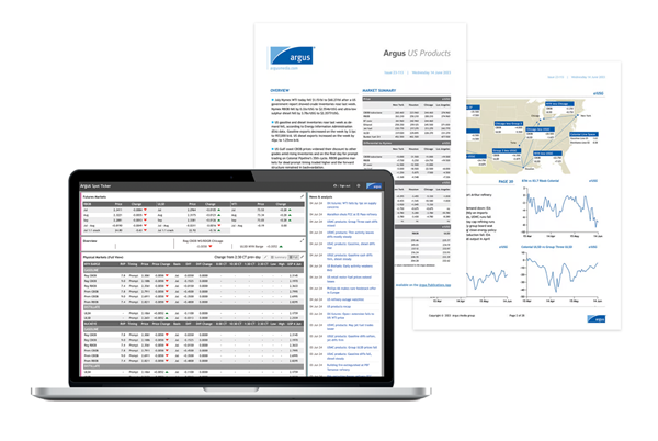 A computer and papers with data on screen Description automatically generated with medium confidence